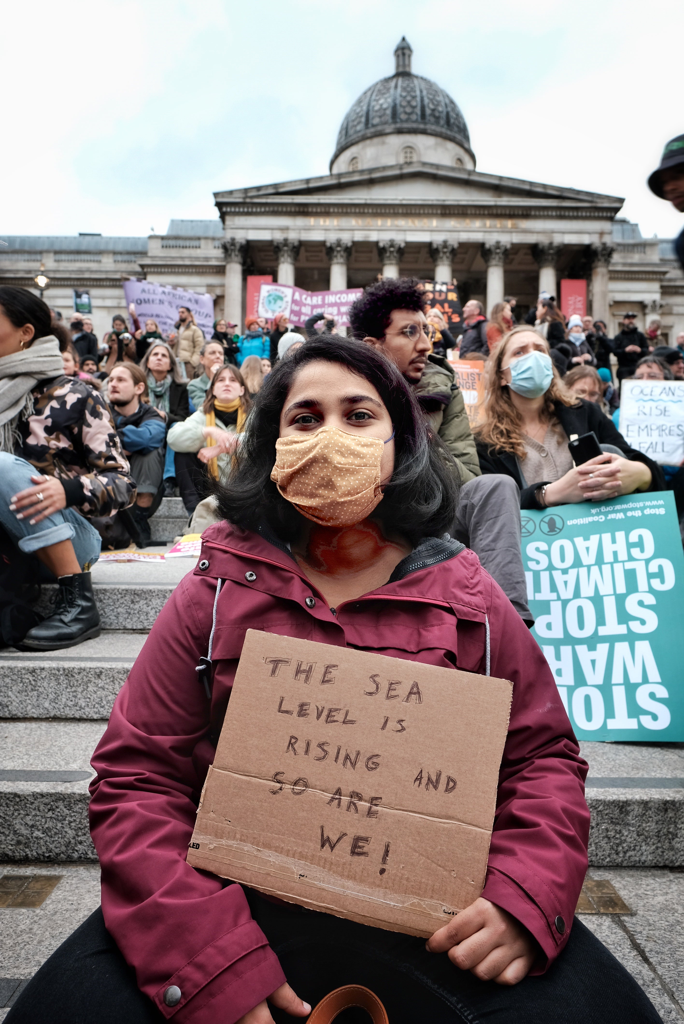 Protesters in Trafalgar Square on 6 November to demand action from world leaders to combat the climate crisis