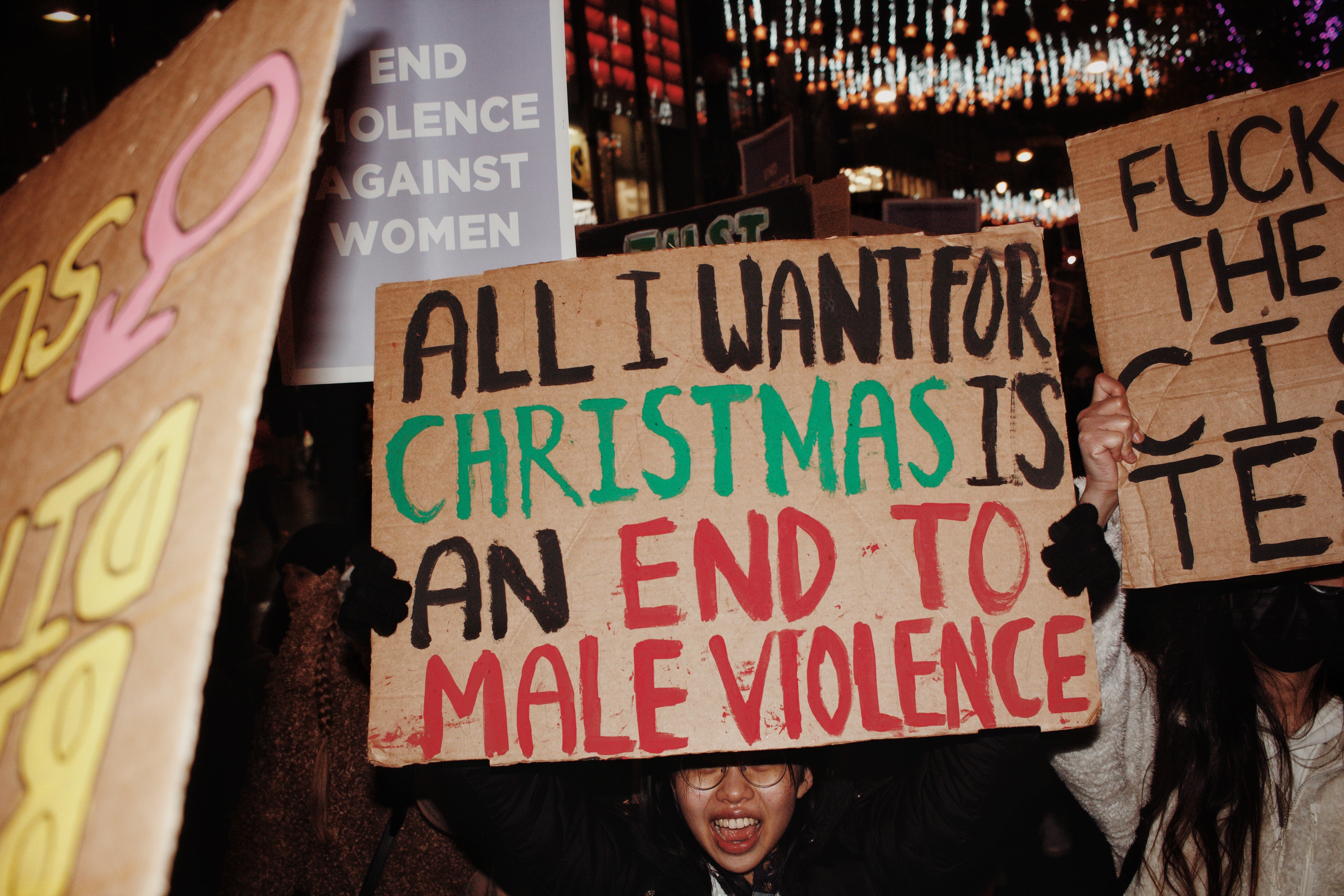 A protester holds a placard at the ‘Reclaim the Night’ march in London this year demanding an end to male violence