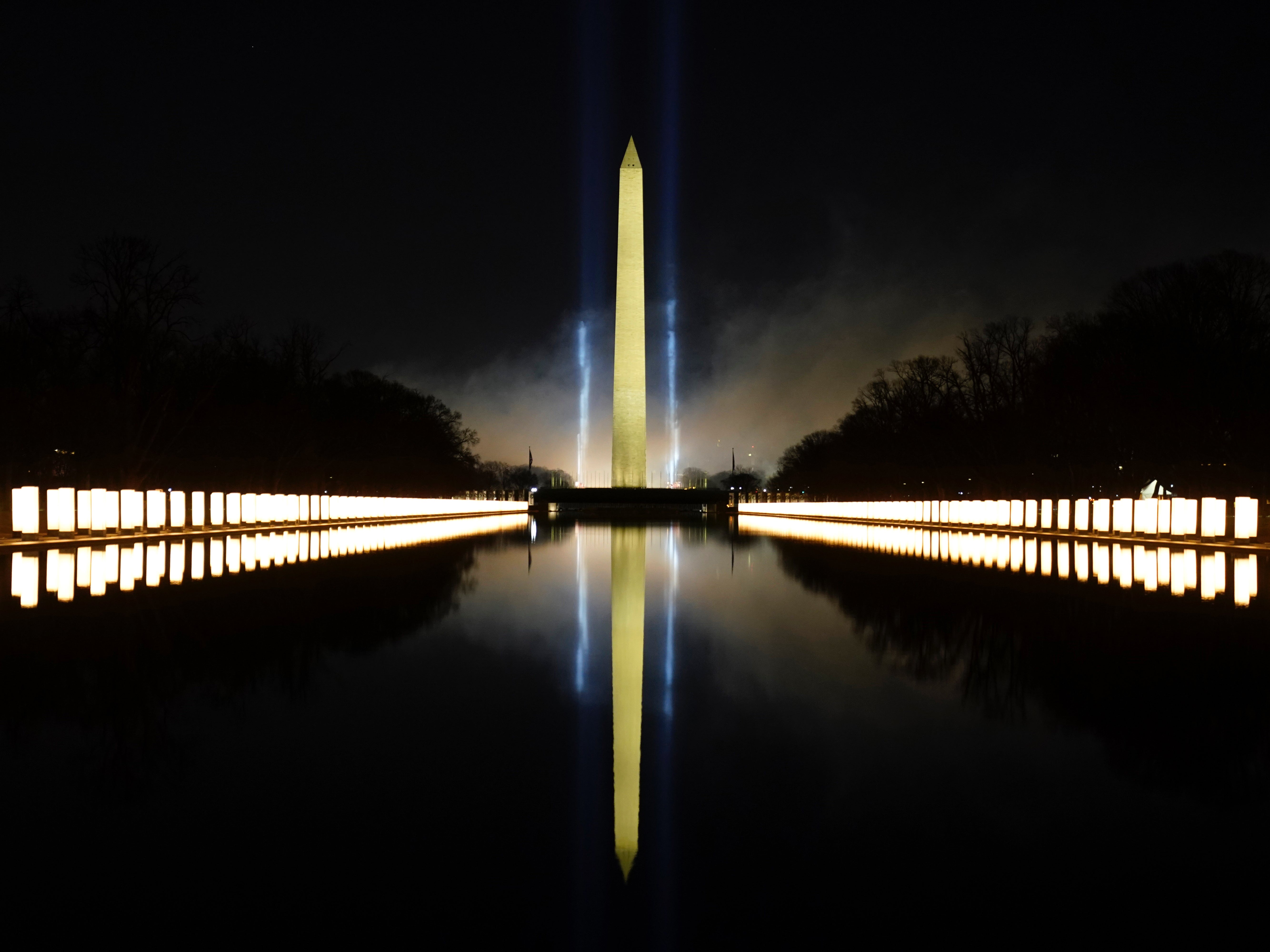 The Washington Monument lit up on 20 January in memory of 400,000 Americans who had died of Covid