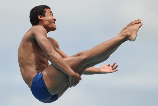 <p>Ian Matos competes in the diving men’s 3m springboard during the final IX South American Games in Medellin, Colombia</p>