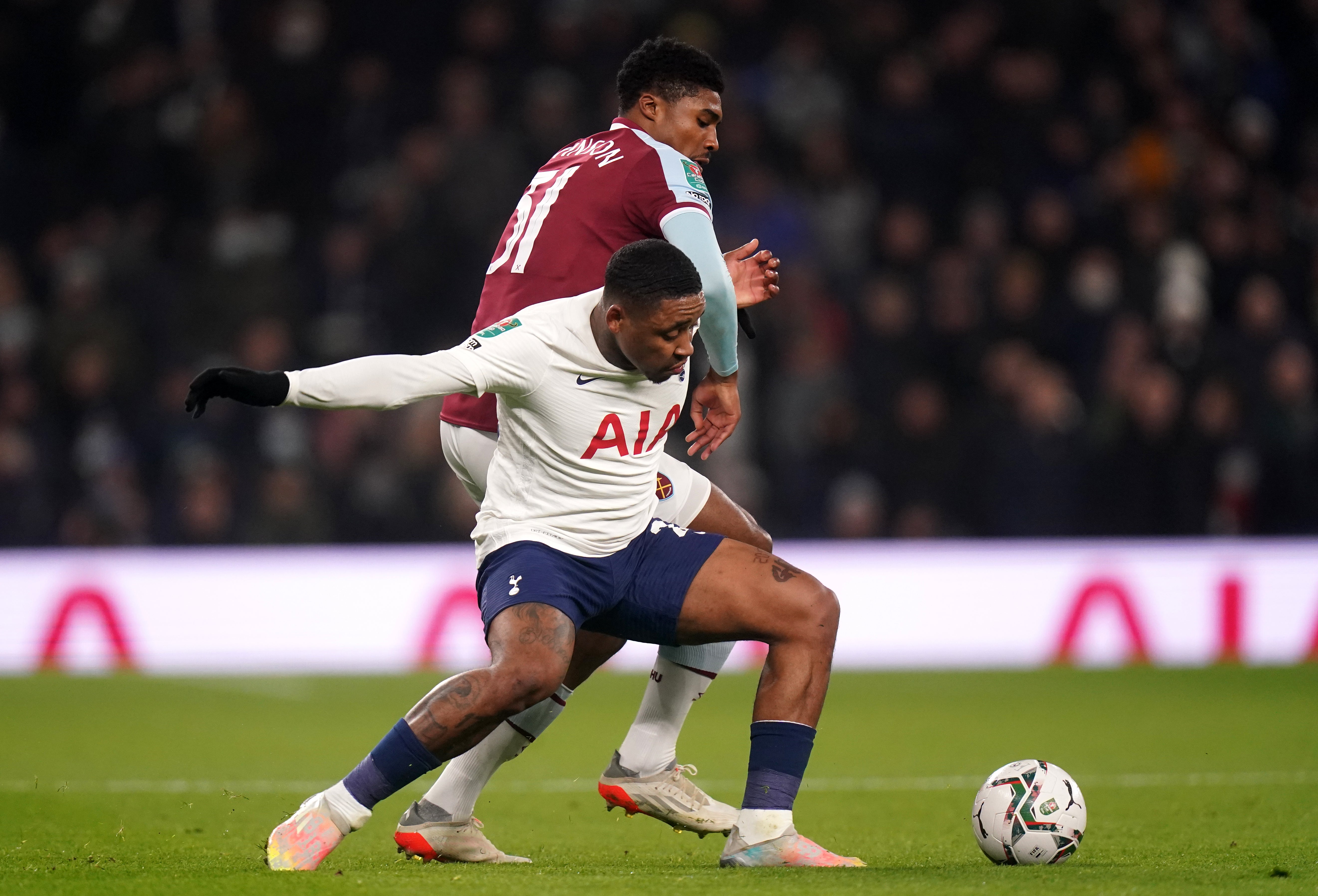 Tottenham’s Steven Bergwijn battles for the ball against West Ham (Adam Davy/PA)