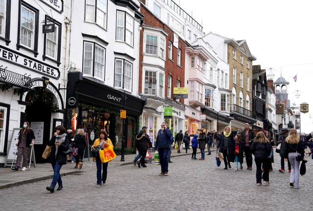 Christmas shoppers in Guildford High Street (Adam Davy/PA)