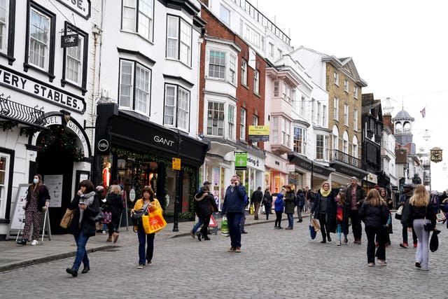 Christmas shoppers in Guildford High Street (Adam Davy/PA)