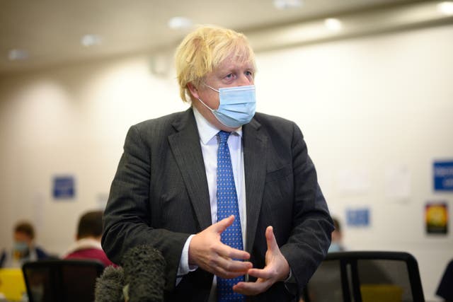 Boris Johnson is being questioned over his Covid-19 strategy (Leon Neal/PA)