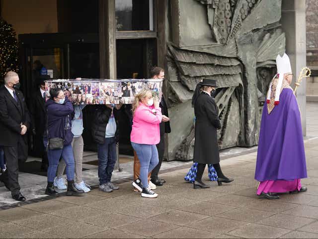 <p>The coffin is carried out of Liverpool Metropolitan Cathedral following Ava White’s funeral</p>