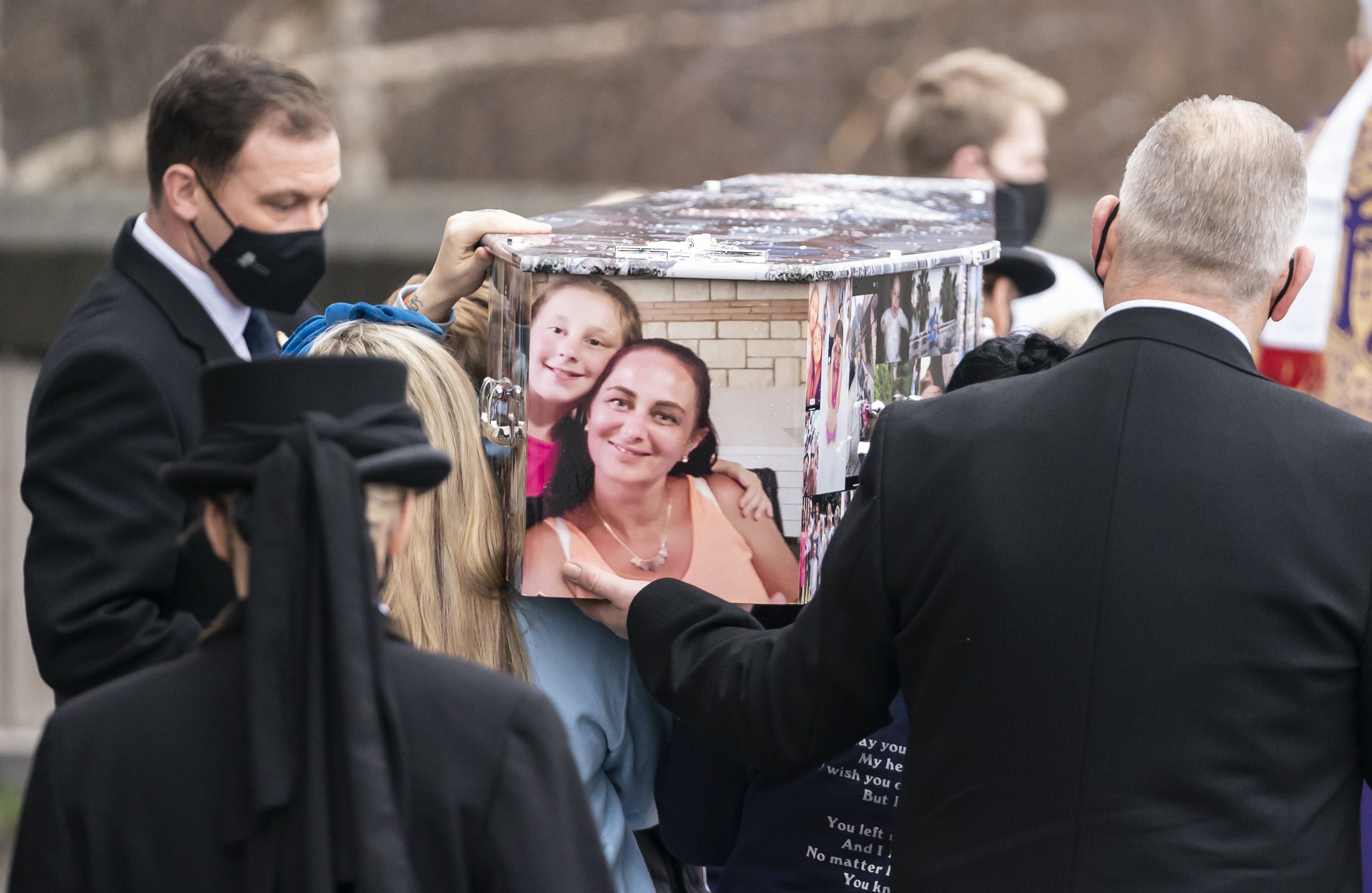 The coffin was covered in photographs of Ava with her family and friend (Danny Lawson/PA)