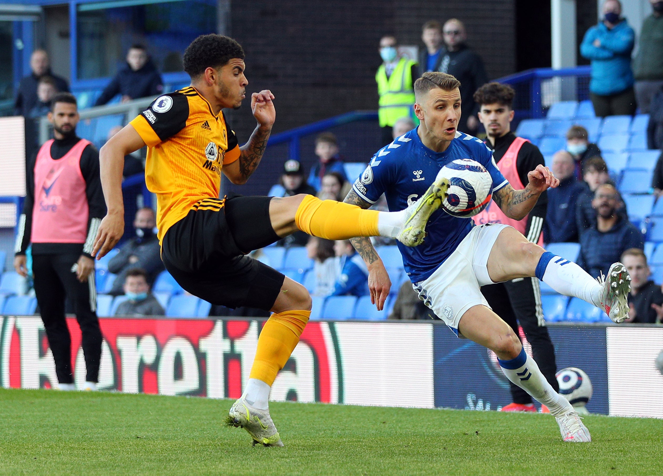 Lucas Digne, right, will be available for the trip to Turf Moor (Peter Byrne/PA)