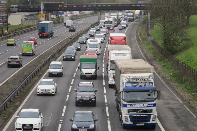 Motorways brought to a standstill and cancelled trains marred the first Christmas getaway in two years (Matthew Cooper/PA)