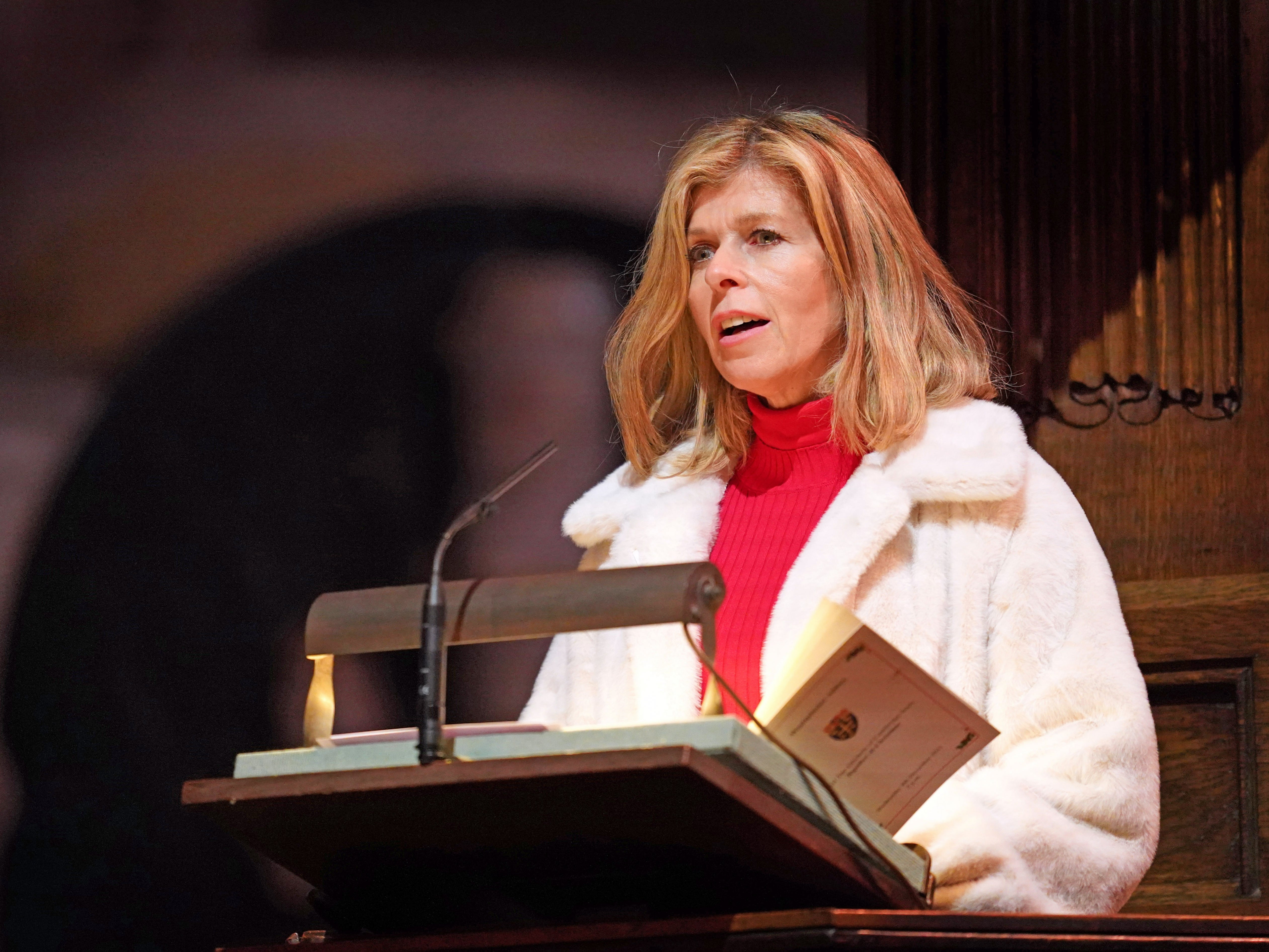 Kate Garraway giving a reading at a Christmas carol concert