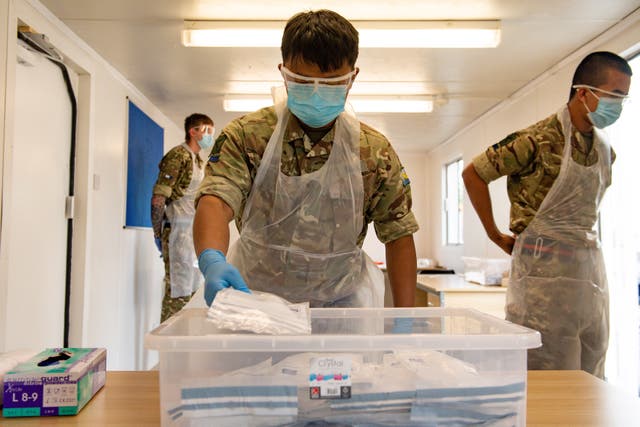 Military personnel are being drafted in to help health boards (Jacob King/PA)