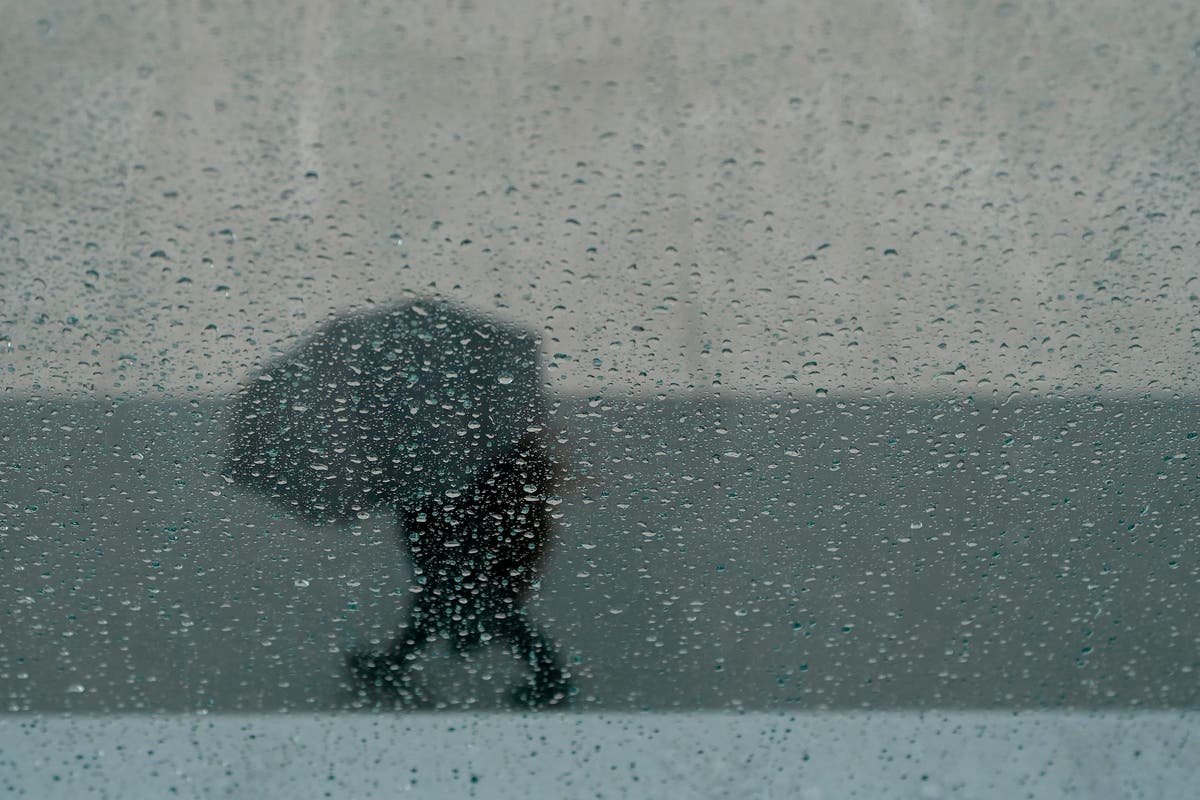2 dead in submerged car as California storm worries spread