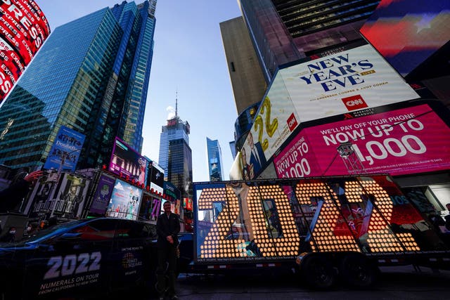 <p>The 2022 sign that will be lit on top of a building on New Year’s Eve is displayed in Times Square, New York, Monday, Dec. 20, 2021. Revelers will still ring in the new year in New York’s Times Square next week, there just won’t be as many of them as usual under new restrictions announced Thursday, Dec. 23, 2021, as the city grapples with a spike in COVID-19 cases. (AP Photo/Seth Wenig, File)</p>