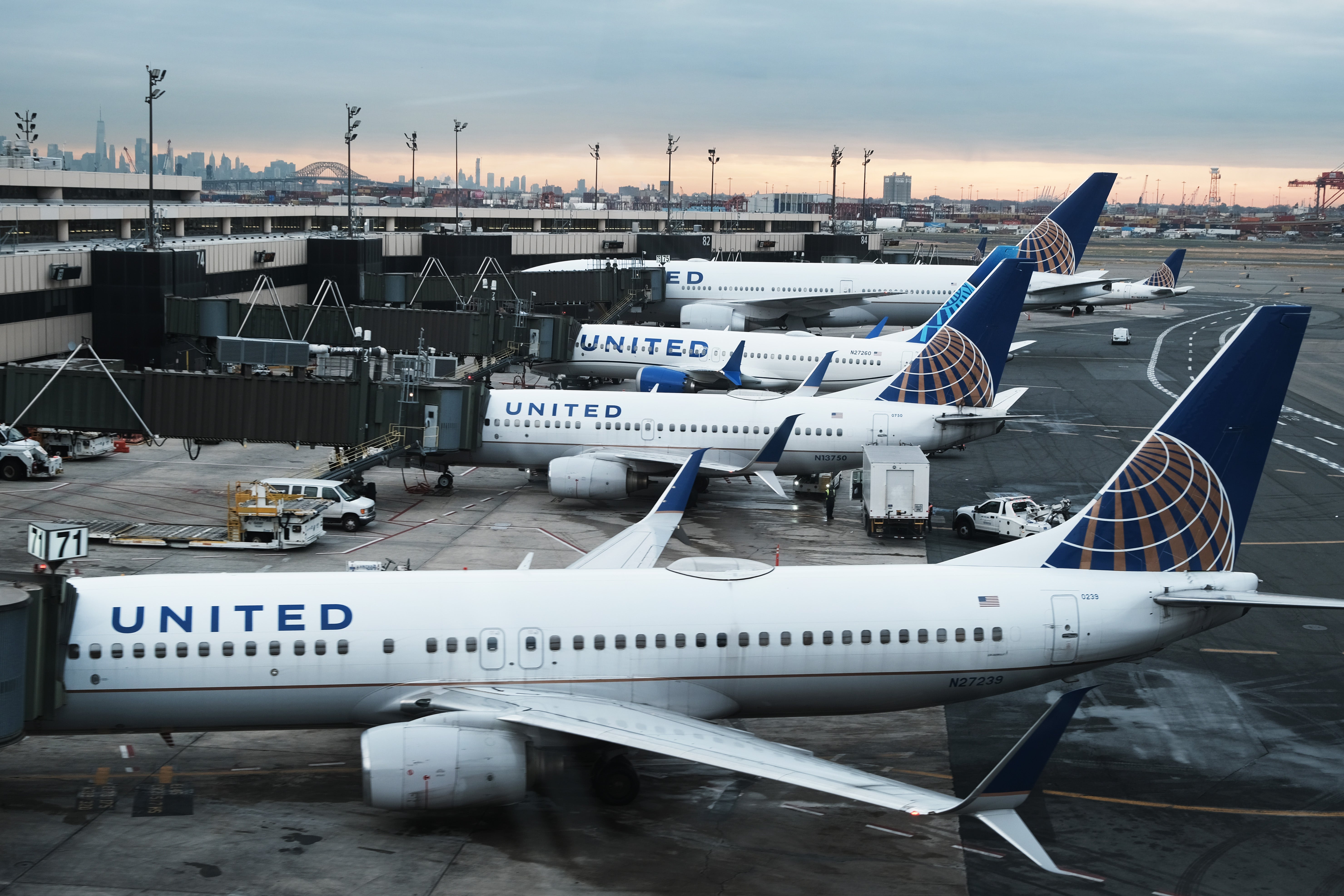 <p>United Airlines planes sit on the runway at Newark Liberty International Airport</p>