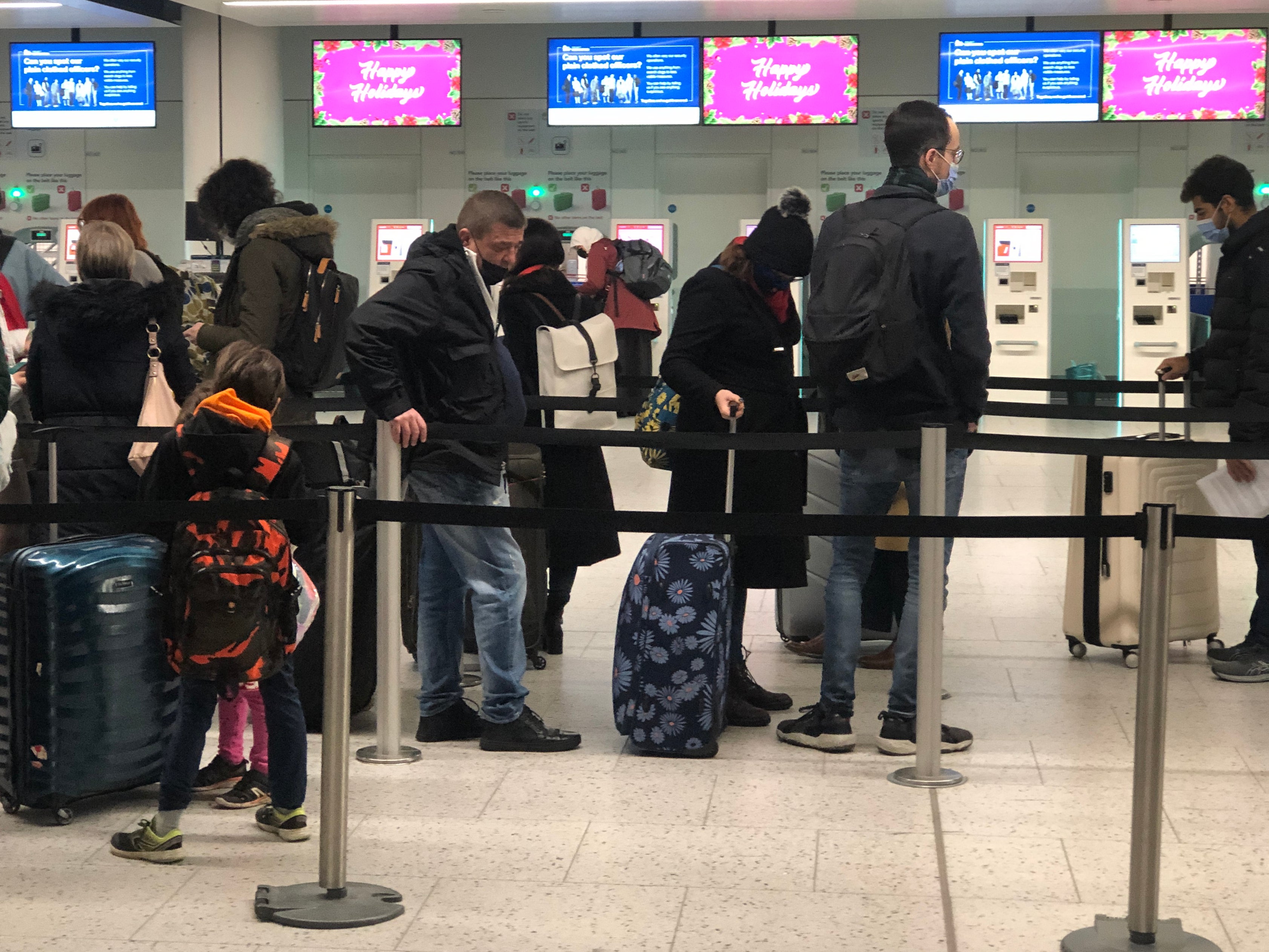Long haul: passengers in the check-in queue at Gatwick airport