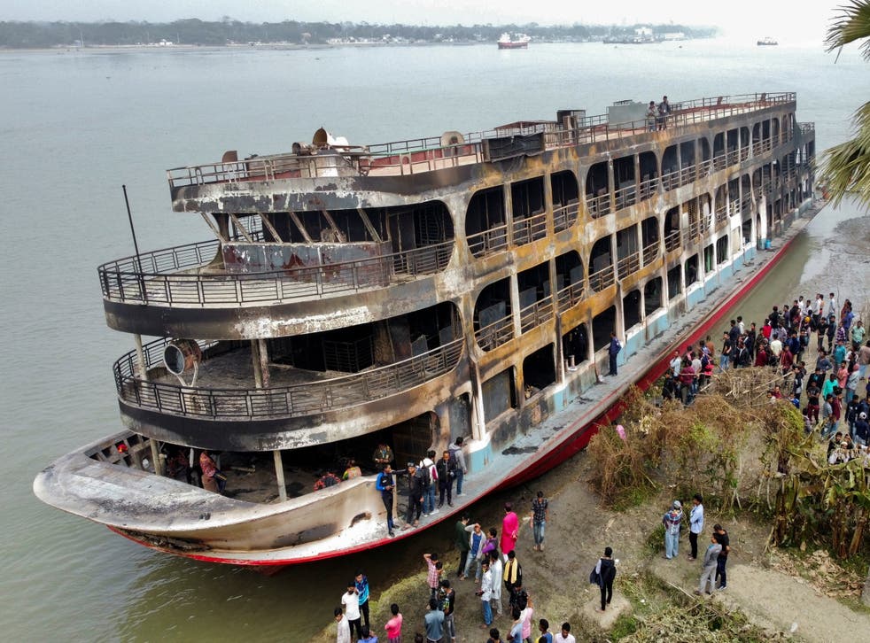 <p>A burnt passenger ferry is seen anchored on the bank of Sugandha river, after a fire that killed at least 38 in Jhalalathi, Bangladesh on Friday </p>
