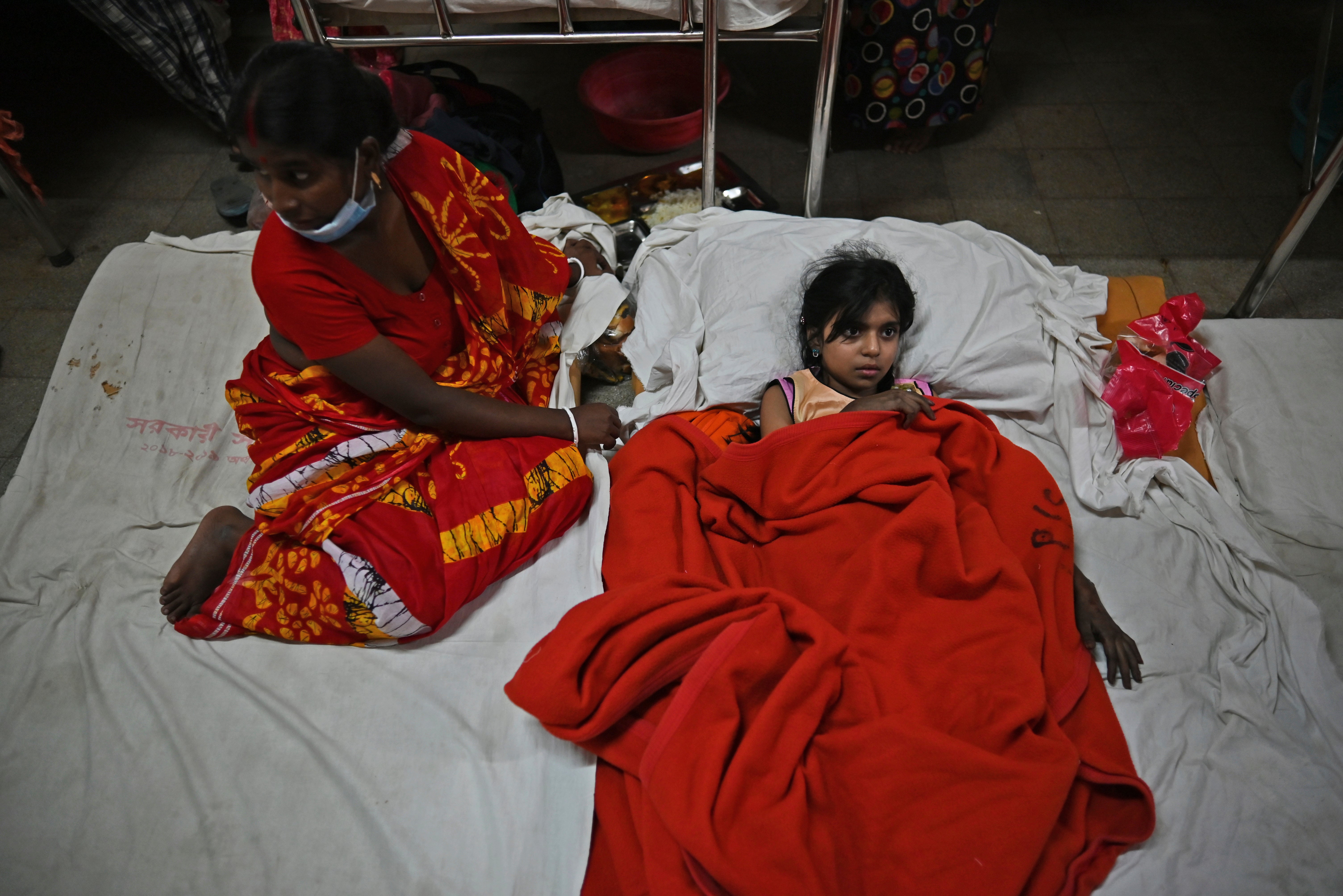 A girl rescued from the ferry fire is treated at a government medical hospital in Barishal, Bangladesh