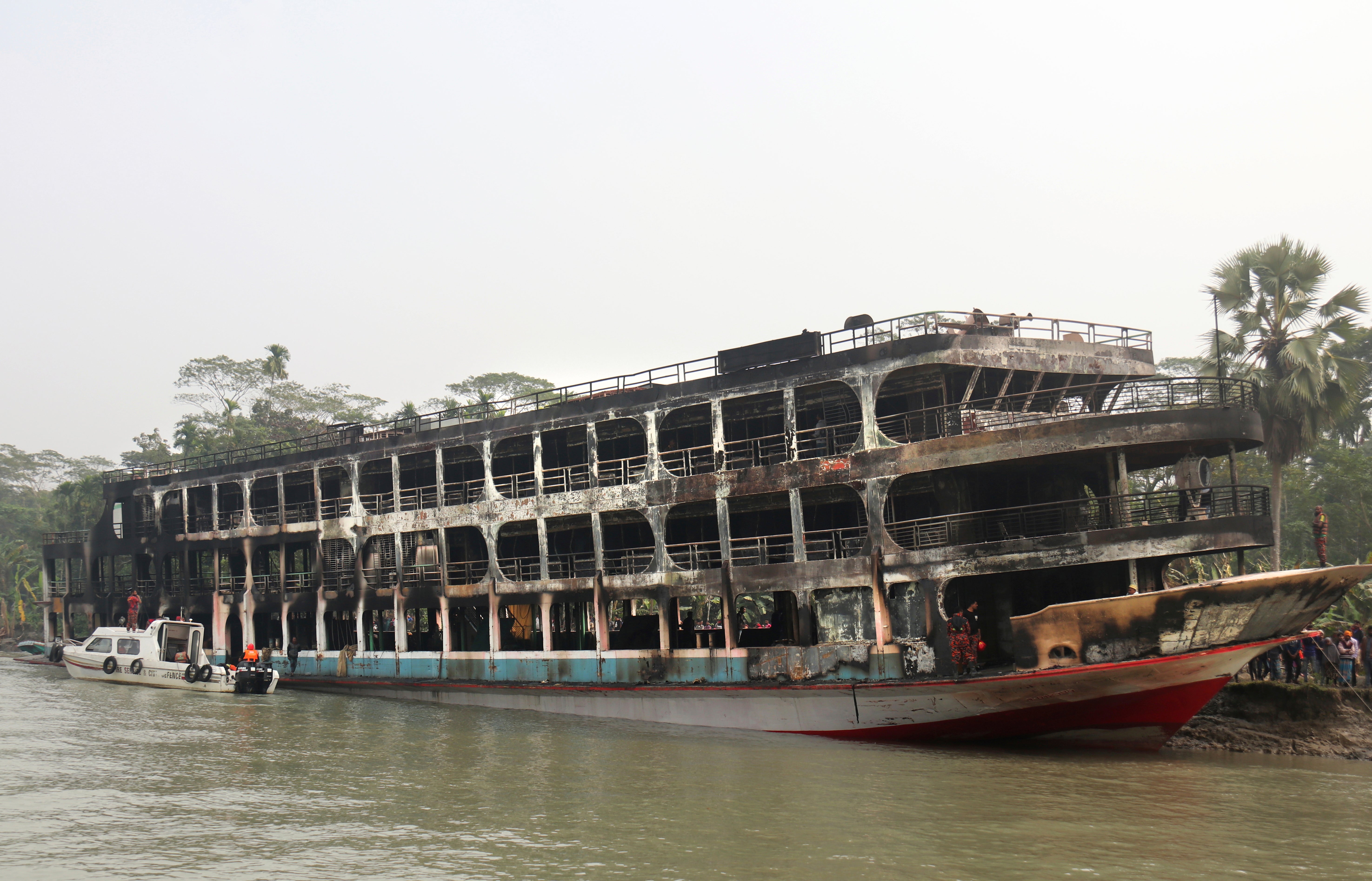 The passenger ferry is seen anchored off the coast of Jhalokati district on the Sugandha river