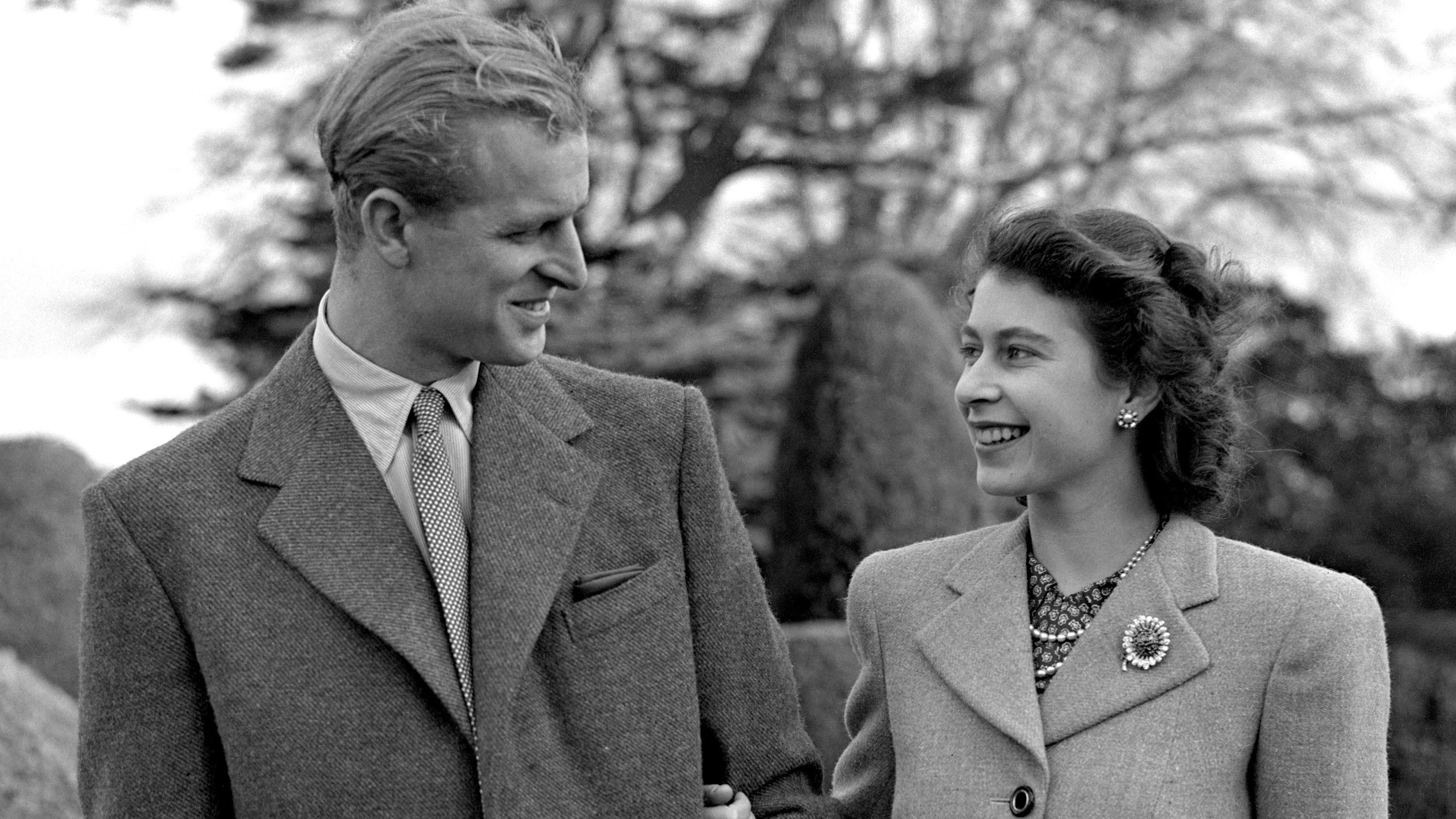 Princess Elizabeth in 1947 enjoying a stroll with her husband, the Duke of Edinburgh, at Broadlands, Hampshire, during their first public appearance since their wedding (PA)