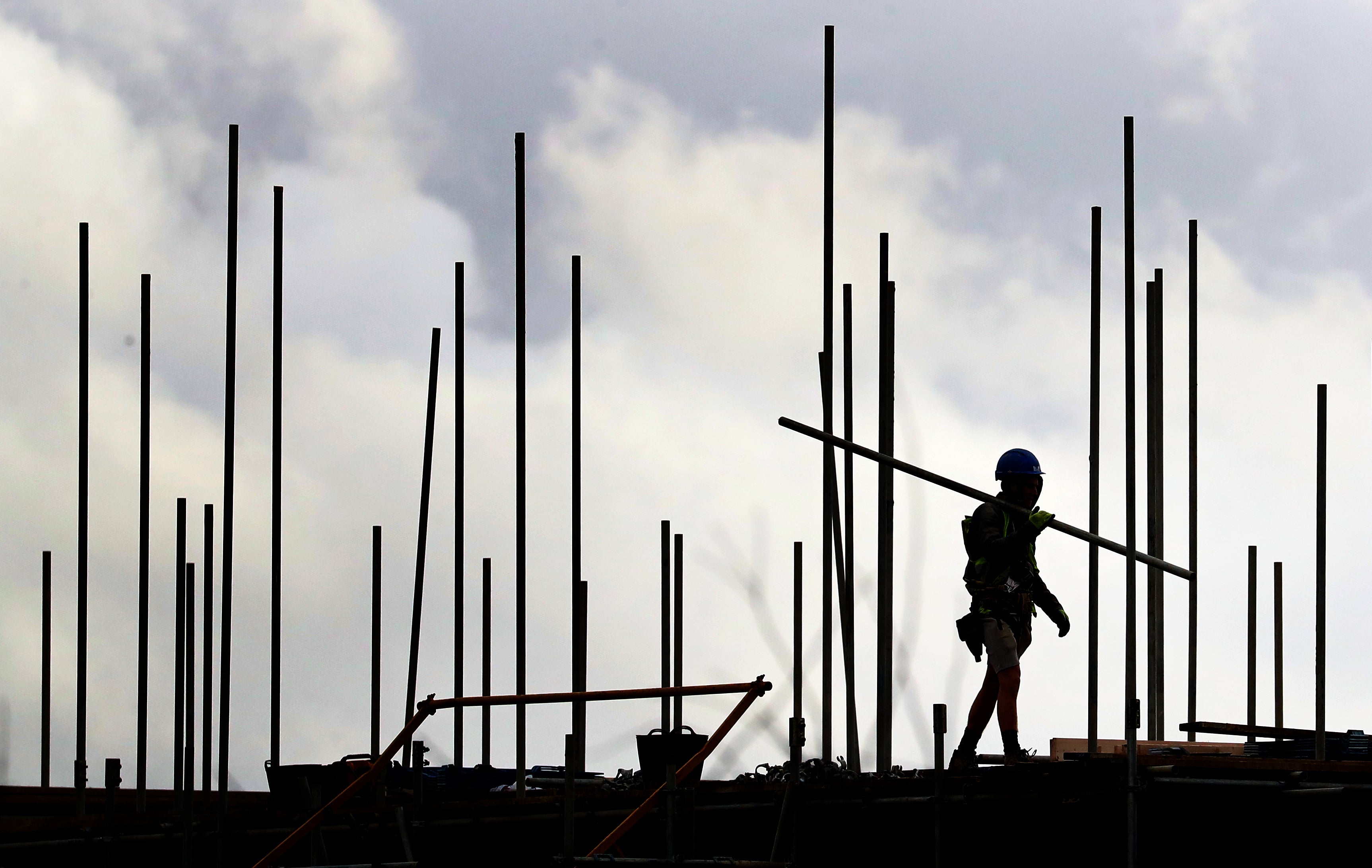 Construction, building and transport workers are among those least likely to have received a booster or third dose of Covid-19 vaccine, figures suggest (Gareth Fuller/PA)