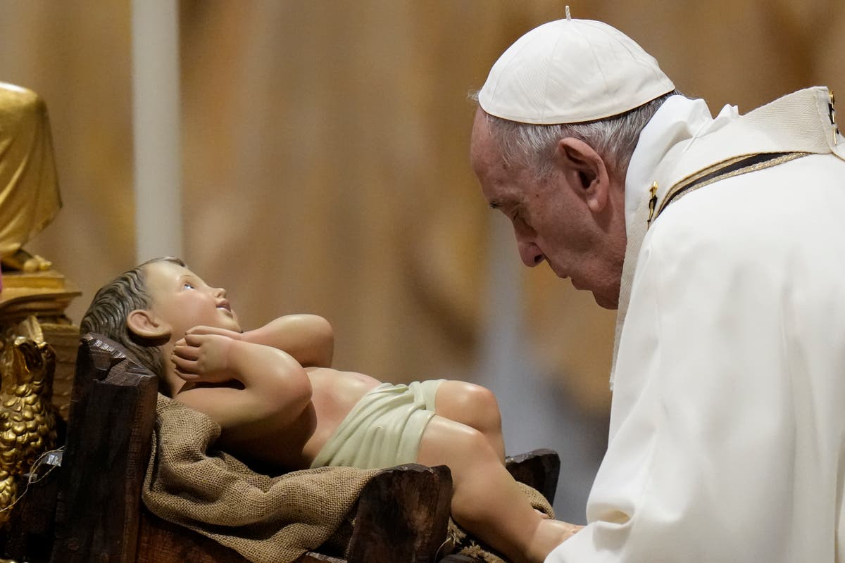 Pope celebrates Christmas Eve Mass as virus surges in Italy