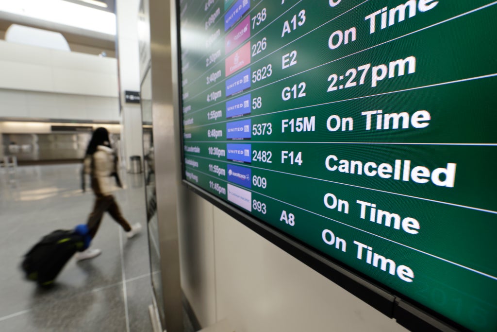 Hundreds of flights cancelled on Christmas Day as Omicron travel woes continue