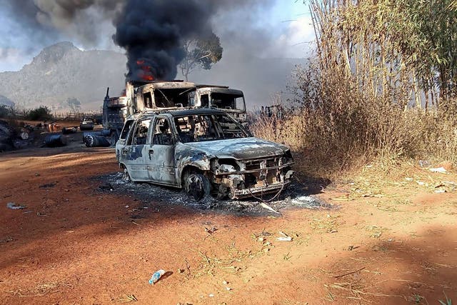 <p>Destroyed vehicles in Hpruso town in Kayah state, where the bodies were found </p>