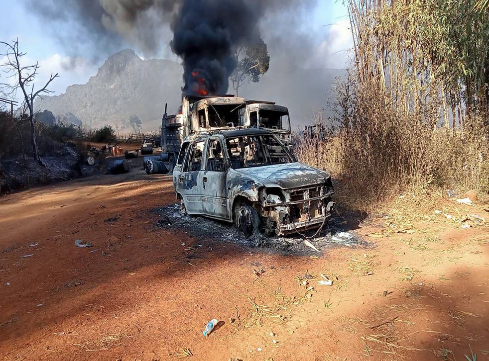 <p>Destroyed vehicles in Hpruso town in Kayah state, where the bodies were found </p>