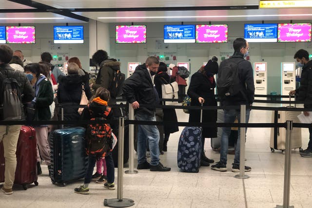 <p>Any chance of a sit-down? Passengers queue at Gatwick airport </p>