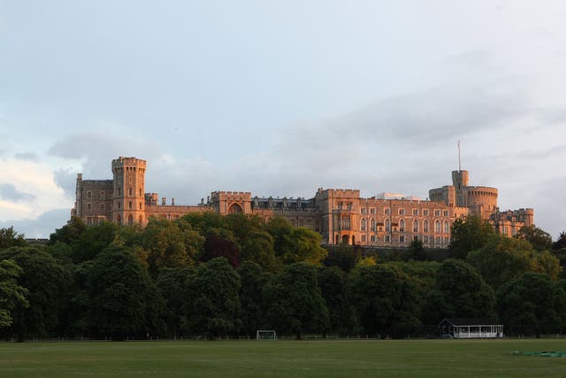 A general view of the sun setting on Windsor Castle (Steve Parsons/PA)