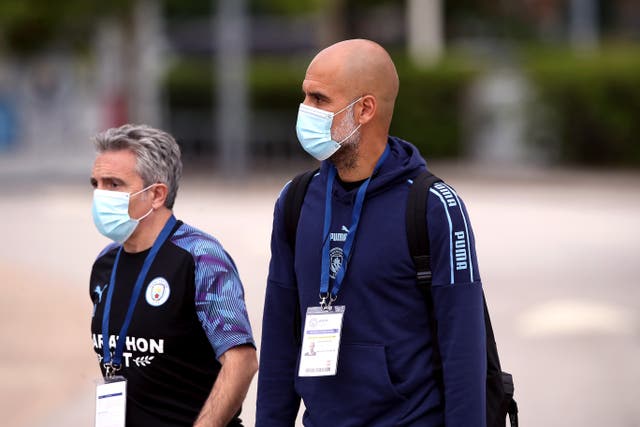 Pep Guardiola wants to see more fans wearing masks (Martin Rickett/NMC Pool)