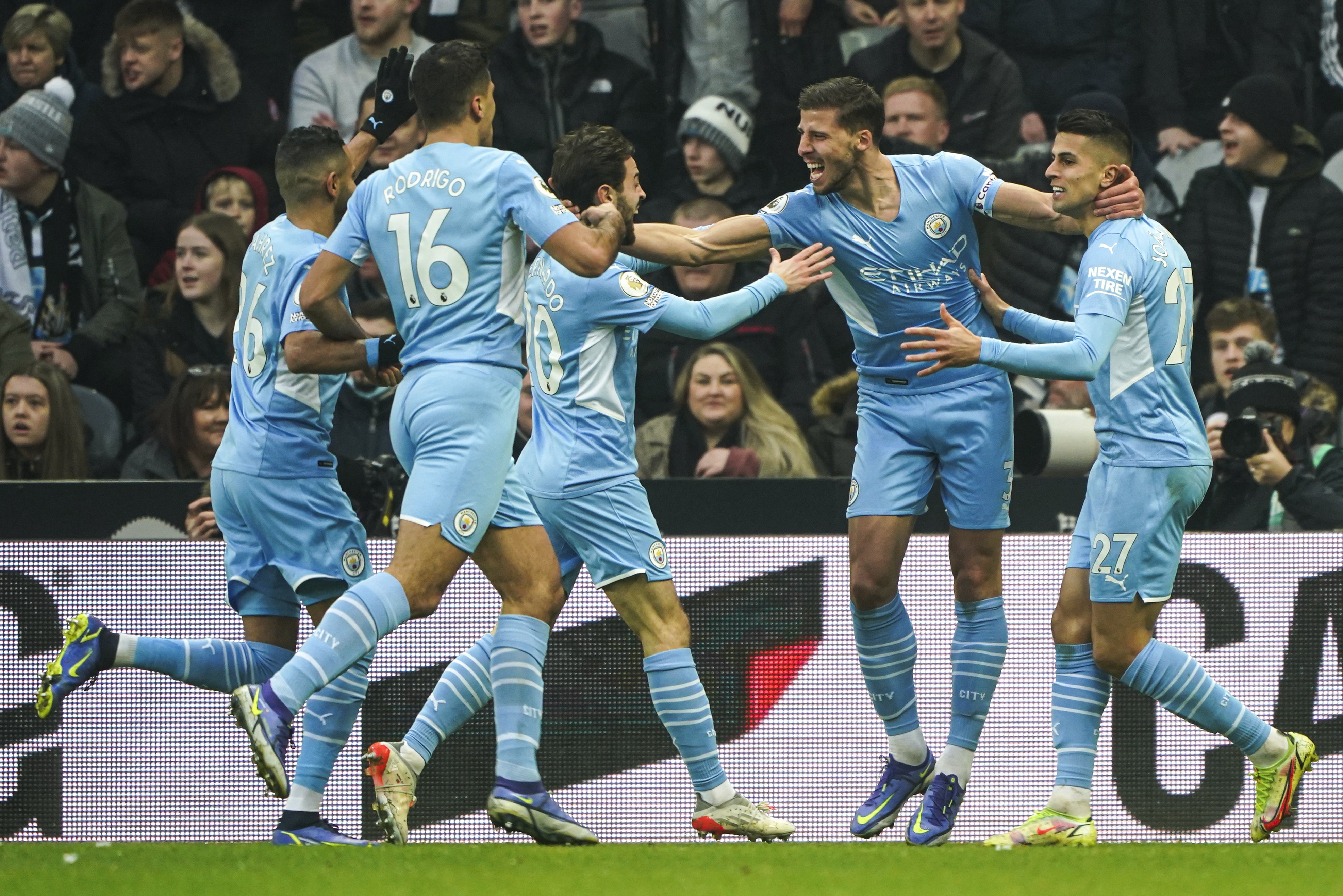 Leaders Manchester City are three points clear after eight successive wins (Owen Humphreys/PA)