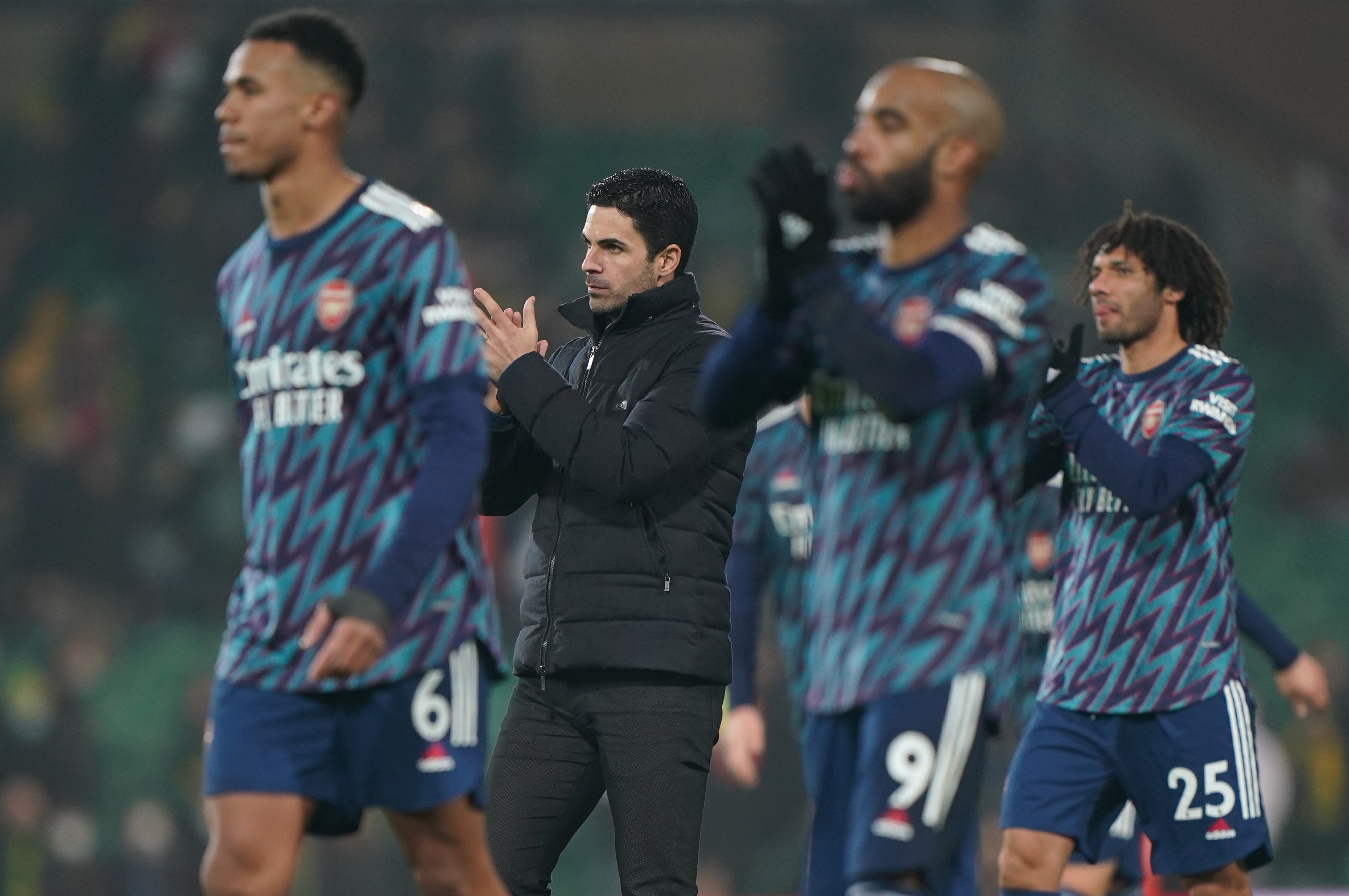 Mikel Arteta and his players applaud the travelling Arsenal fans