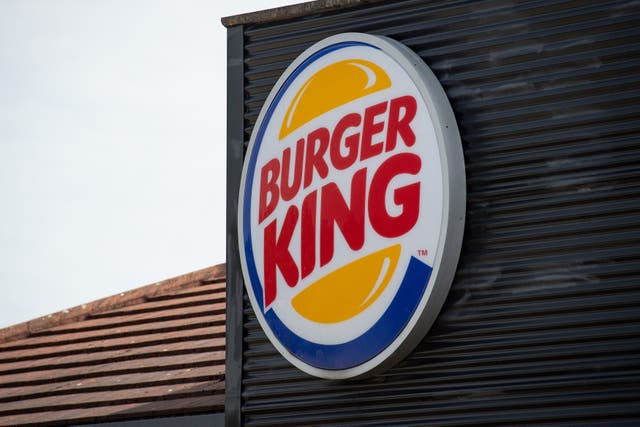 Burger King UK has agreed a deal to acquire 12 new restaurants from franchise partners (Jacob King/PA)