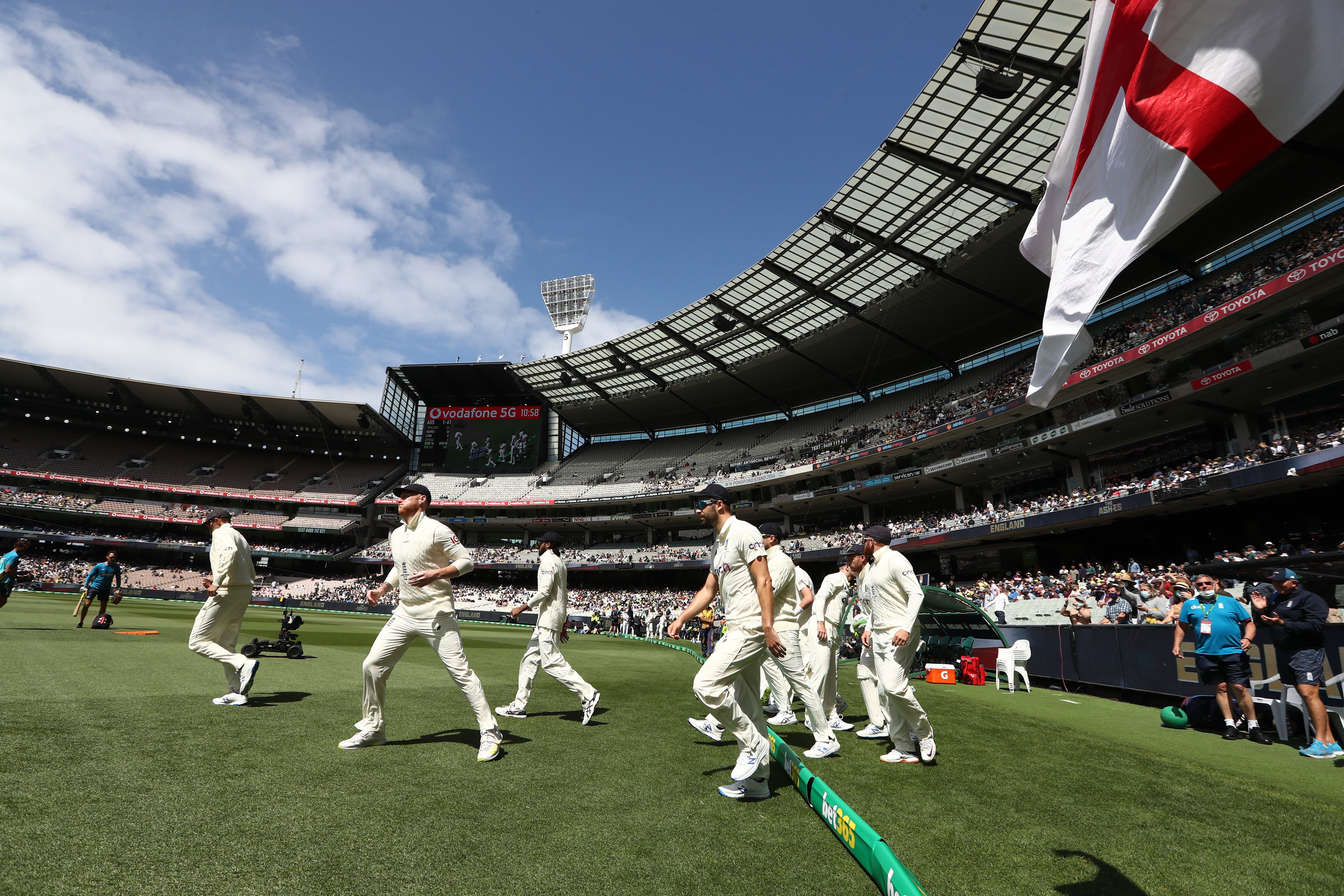 England take the field during day two of the third Ashes test at the Melbourne Cricket Ground (Jason O’Brien/PA)