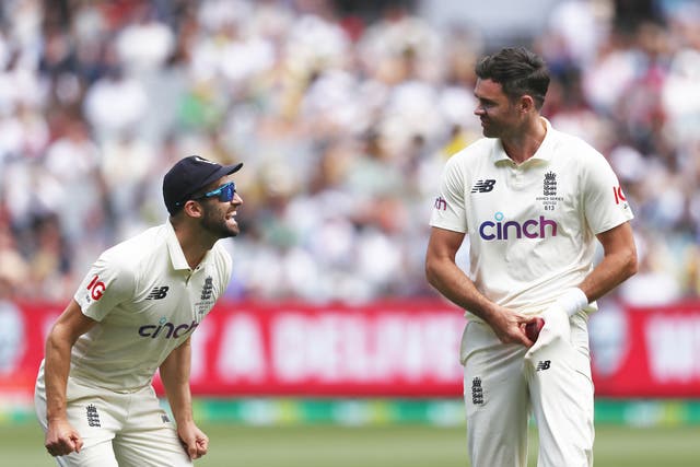 James Anderson, right, led the way as England’s bowlers brushed off the chaos of a Covid scare to give England a foothold on day two of the Boxing Day Ashes Test (Jason O’Brien/PA)