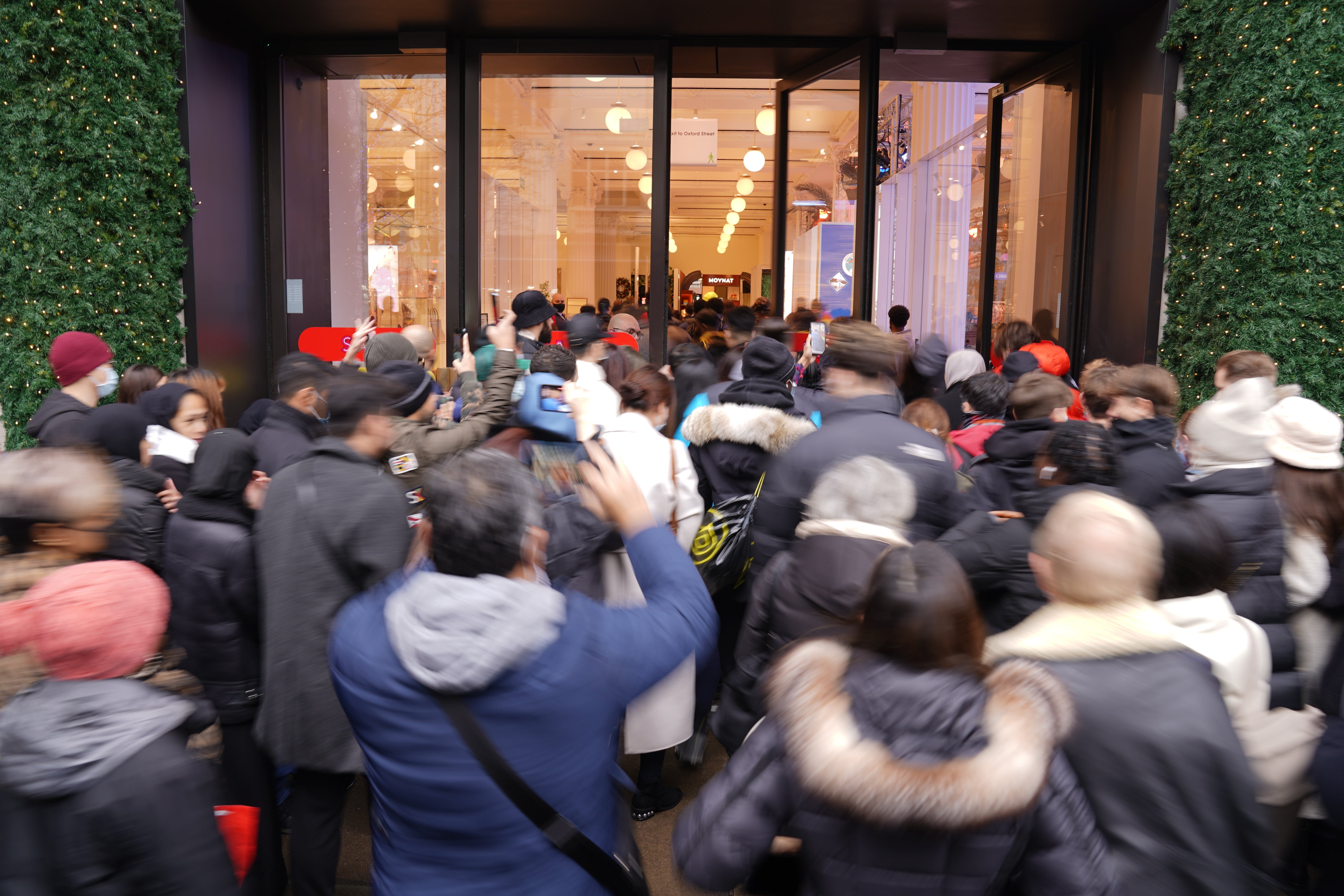 There were queues outside some stores (Jonathan Brady/PA)