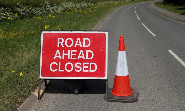 The road was closed for around seven hours (David Davies/PA)