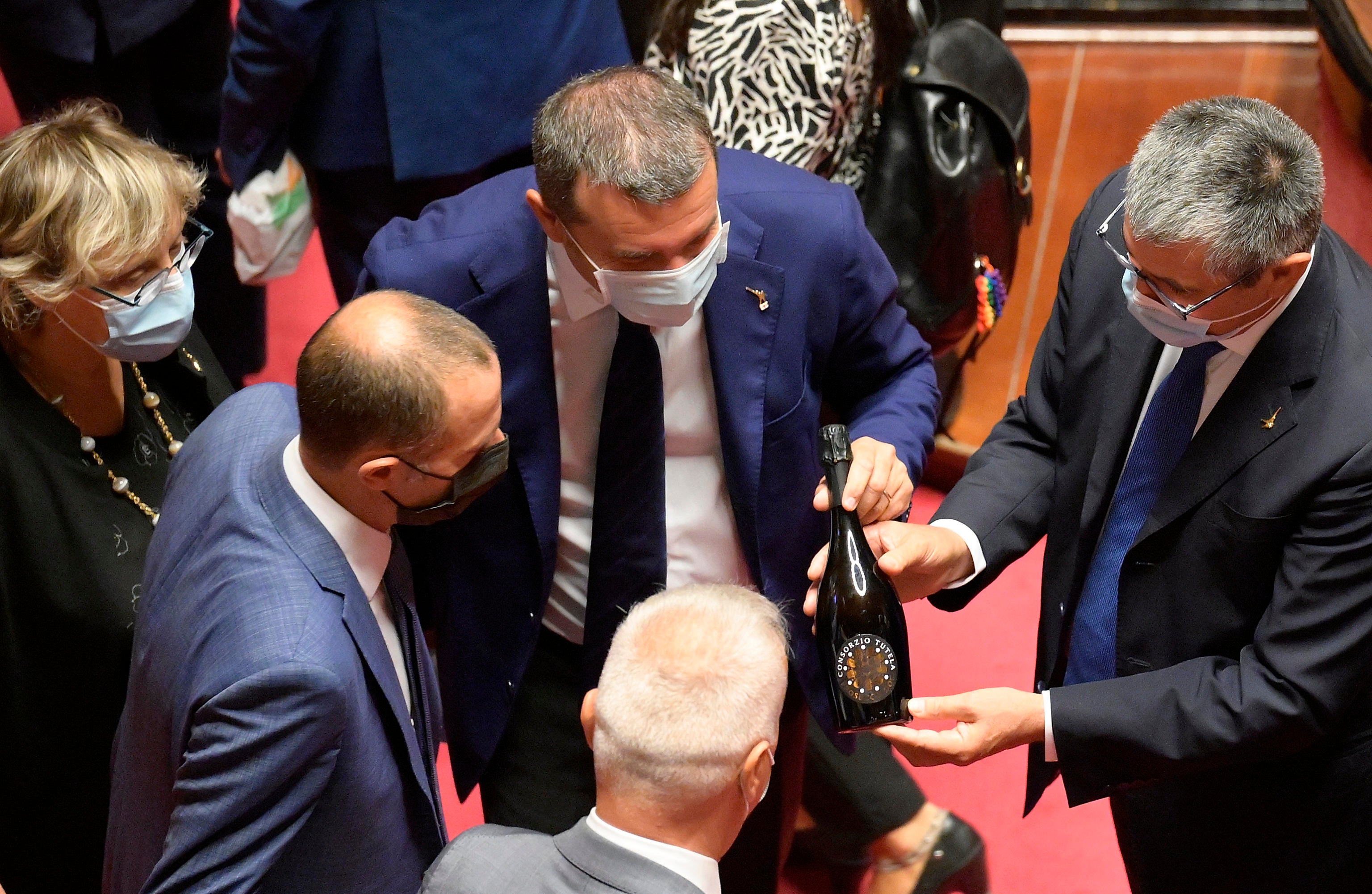 File photo: Italian lawmakers show bottles of Prosecco during a briefing in Rome, Italy, 22 September 2021