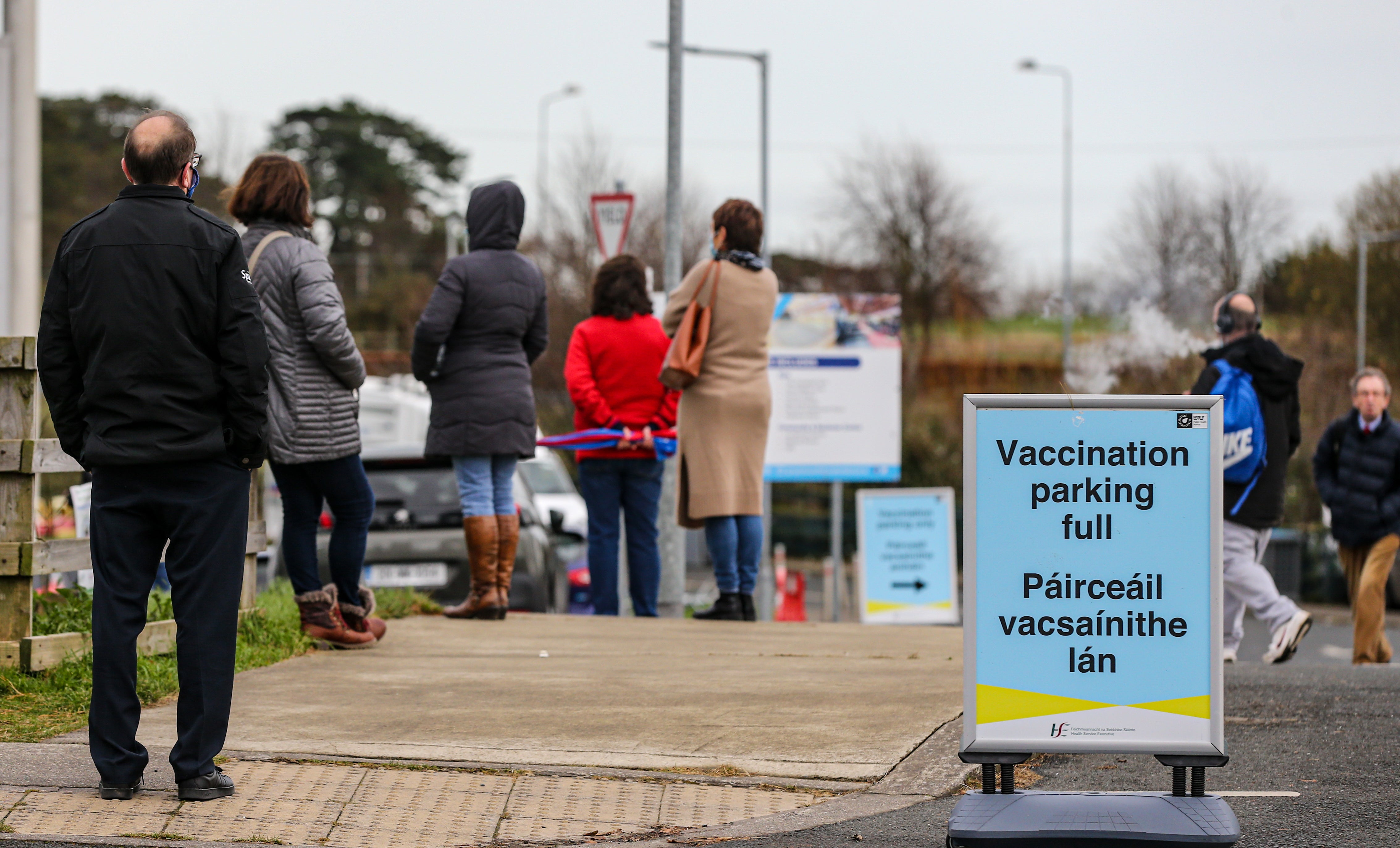 Queues of people form outside a walk-in vaccination centre in Greystones, Co Wicklow (Damien Storan/PA)