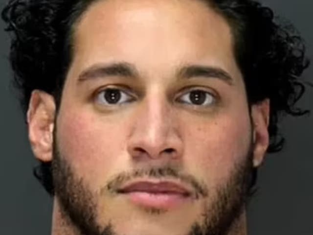 <p>Dino Tomasetti, 29, a bodybuilder and personal trainer who allegedly shot his millionaire parents at the Long Island home on Christmas day, 2021</p>