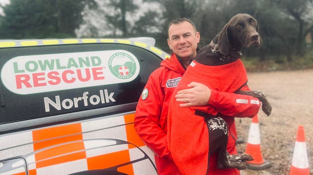 Search and rescue dog Juno with owner Ian Danks (Norfolk Lowland Search and Rescue/Facebook/PA)