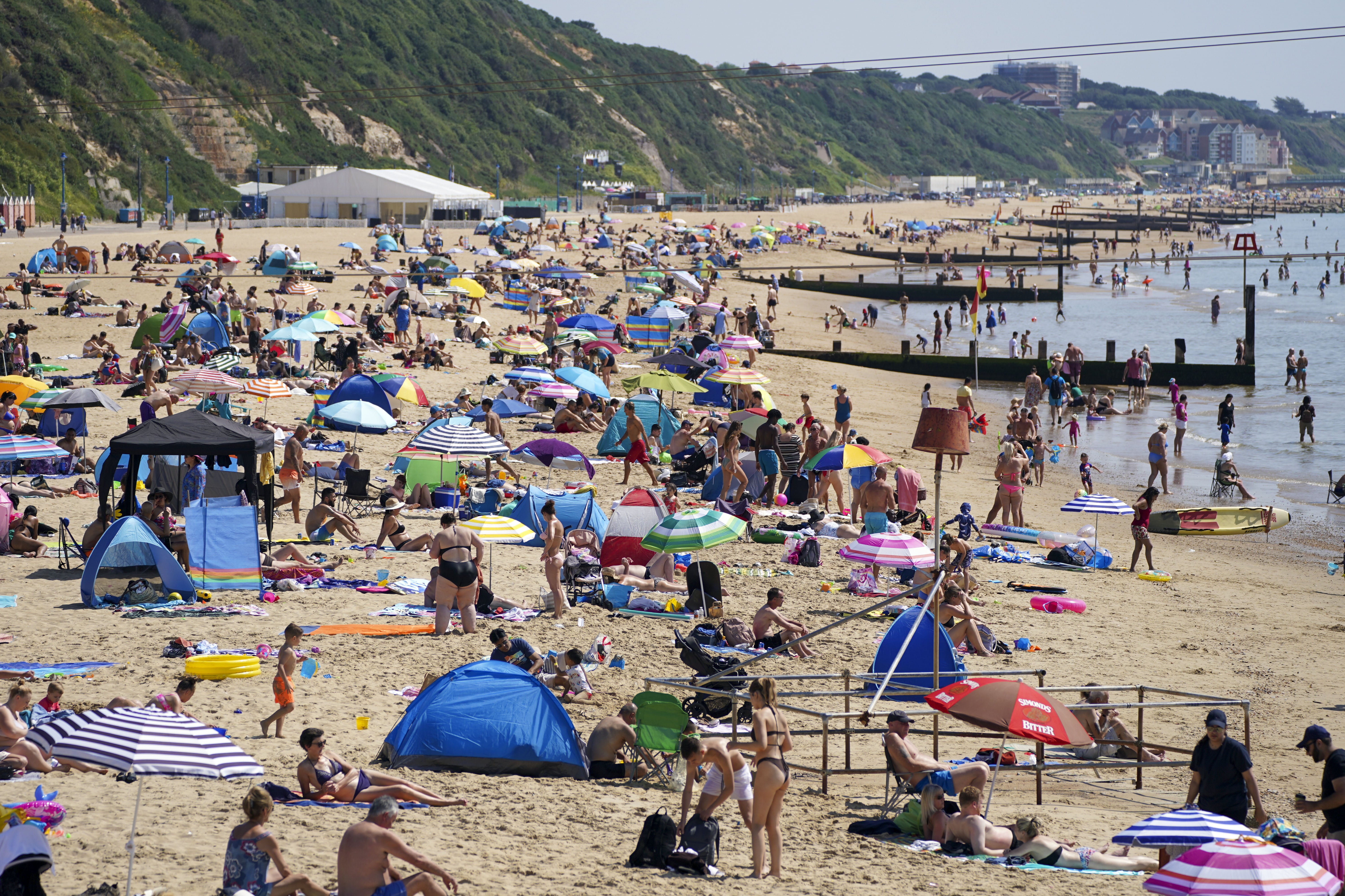 It coincided with a heatwave for many, so people were able to enjoy their new freedoms in blazing sunshine (Steve Parsons/PA)