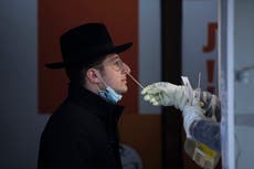 Hard-hit by COVID, Israel's ultra-Orthodox slow to get shots