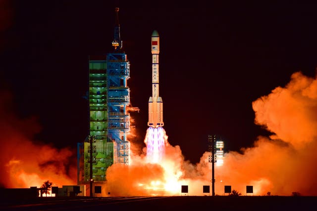 <p>File. China’s Tiangong 2 space lab is launched on a Long March-2F rocket from the Jiuquan Satellite Launch Center in the Gobi Desert, in China’s Gansu province, on 15 September 2016. Elon Musk, the owner of Tesla is facing a massive backlash on Chinese social media after it came to light that Beijing had to take measures to avoid its space station from colliding with Musk’s satellites twice </p>
