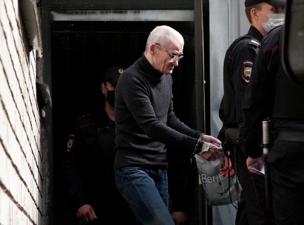 <p>File: Russian historian Yuri Dmitriev is escorted by police officers after a court hearing in Petrozavodsk</p>