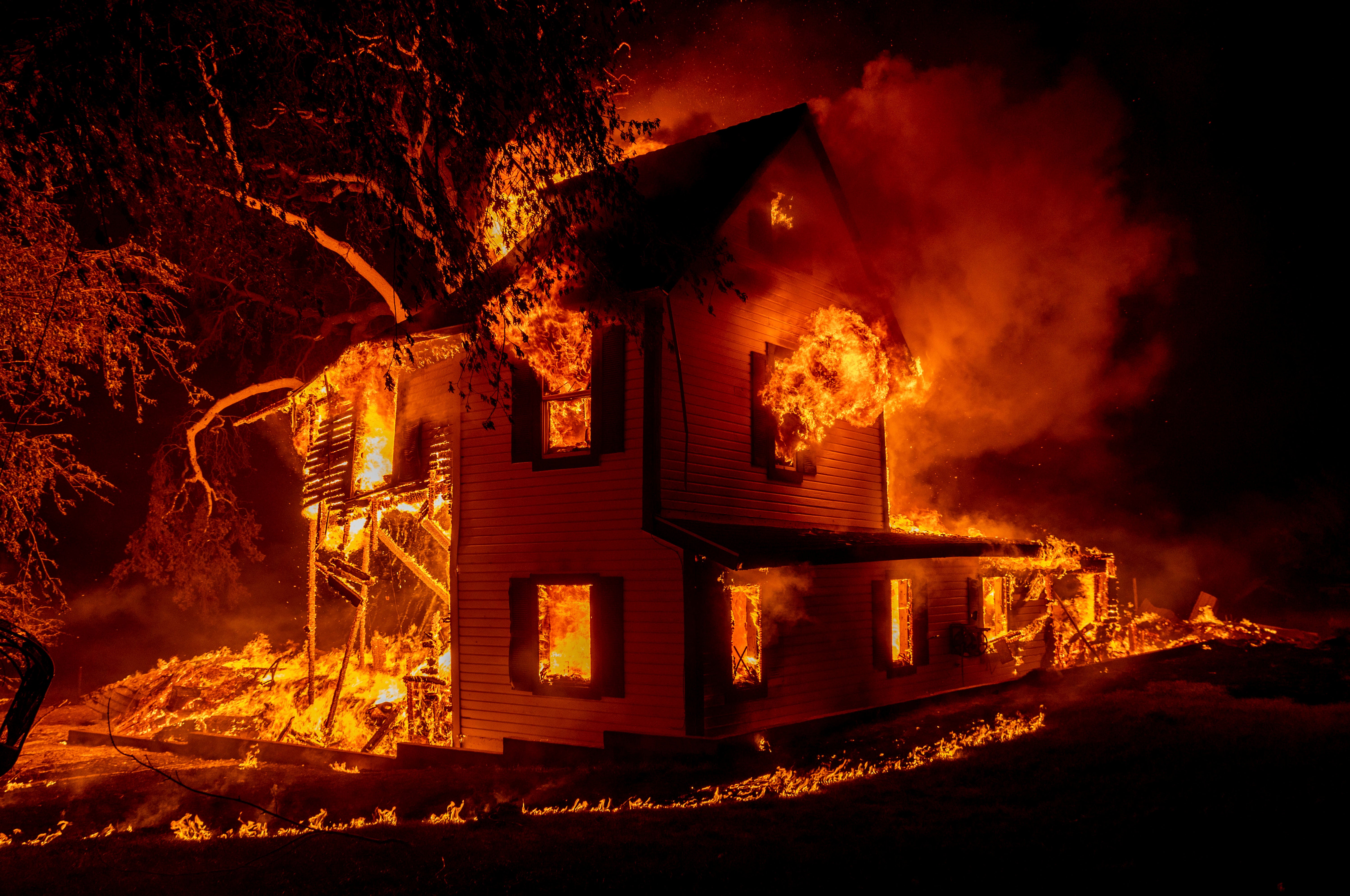A home burns during a wildlife in California, August 2021