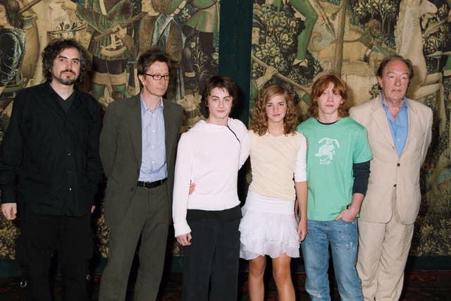 <p>Alfonso Cuaron, Gary Oldman, Daniel Radcliffe, Emma Watson, Rupert Grint and Michael Gambon at a Harry Potter premiere</p>