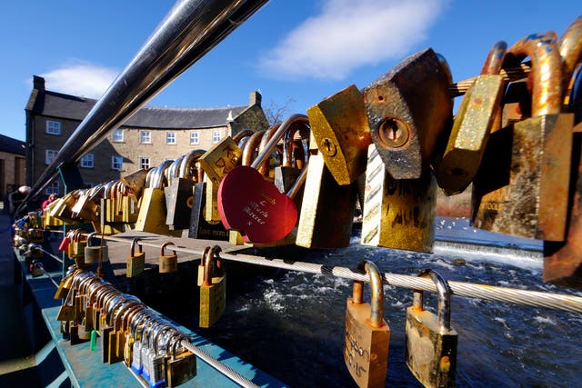 <p>Thousands of  love locks have been locked onto the bridge since 2012 </p>