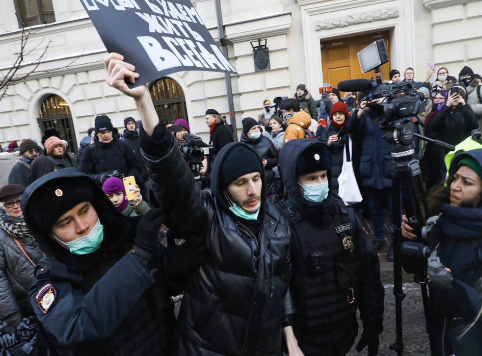 <p>File photo: Police officers detain a demonstrator as people gather in front of the Supreme Court of the Russian Federation, in Moscow, Russia, 28 December 2021 </p>