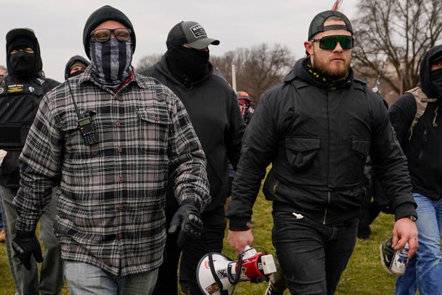 <p>Proud Boys march towards the capitol in Washington, DC. </p>